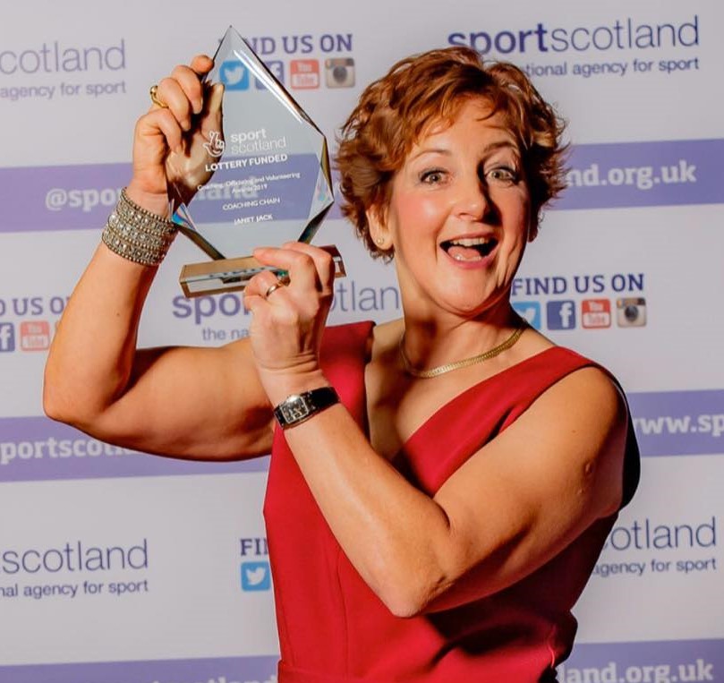 Janet Jack receiving a Coaching Award from Sportscotland