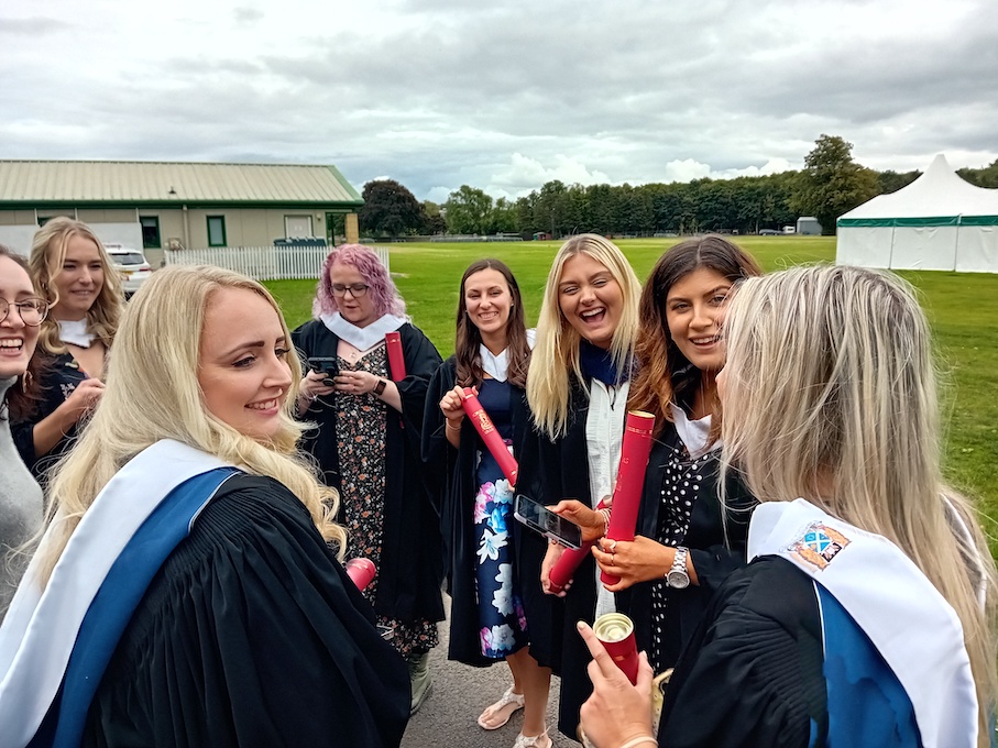 Group of graduates celebrating success