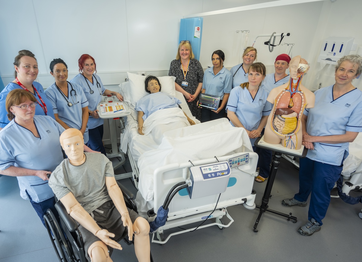 Group of student nurses standing in an education setting