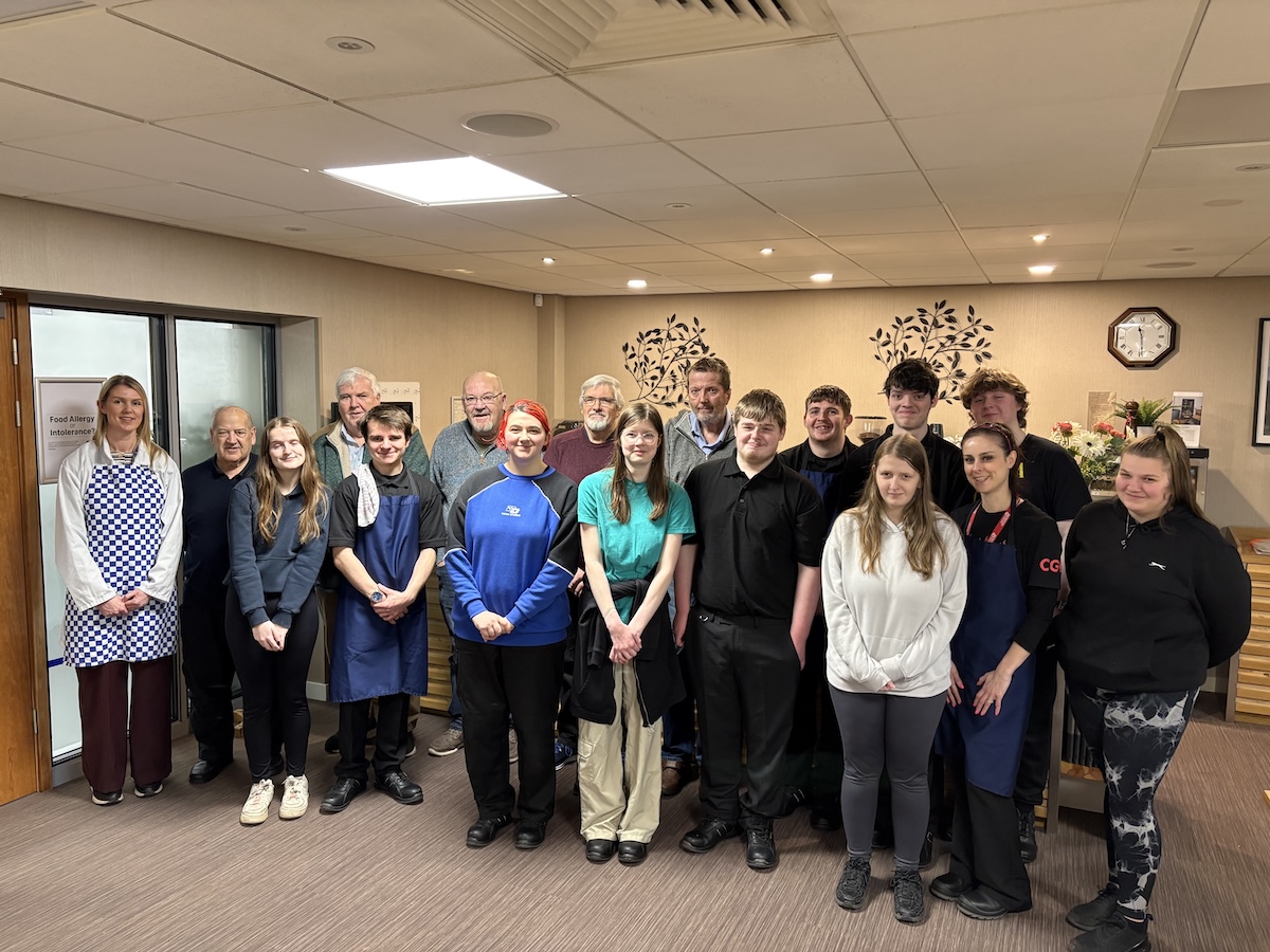 Group of people standing in the Borders College Restaurant